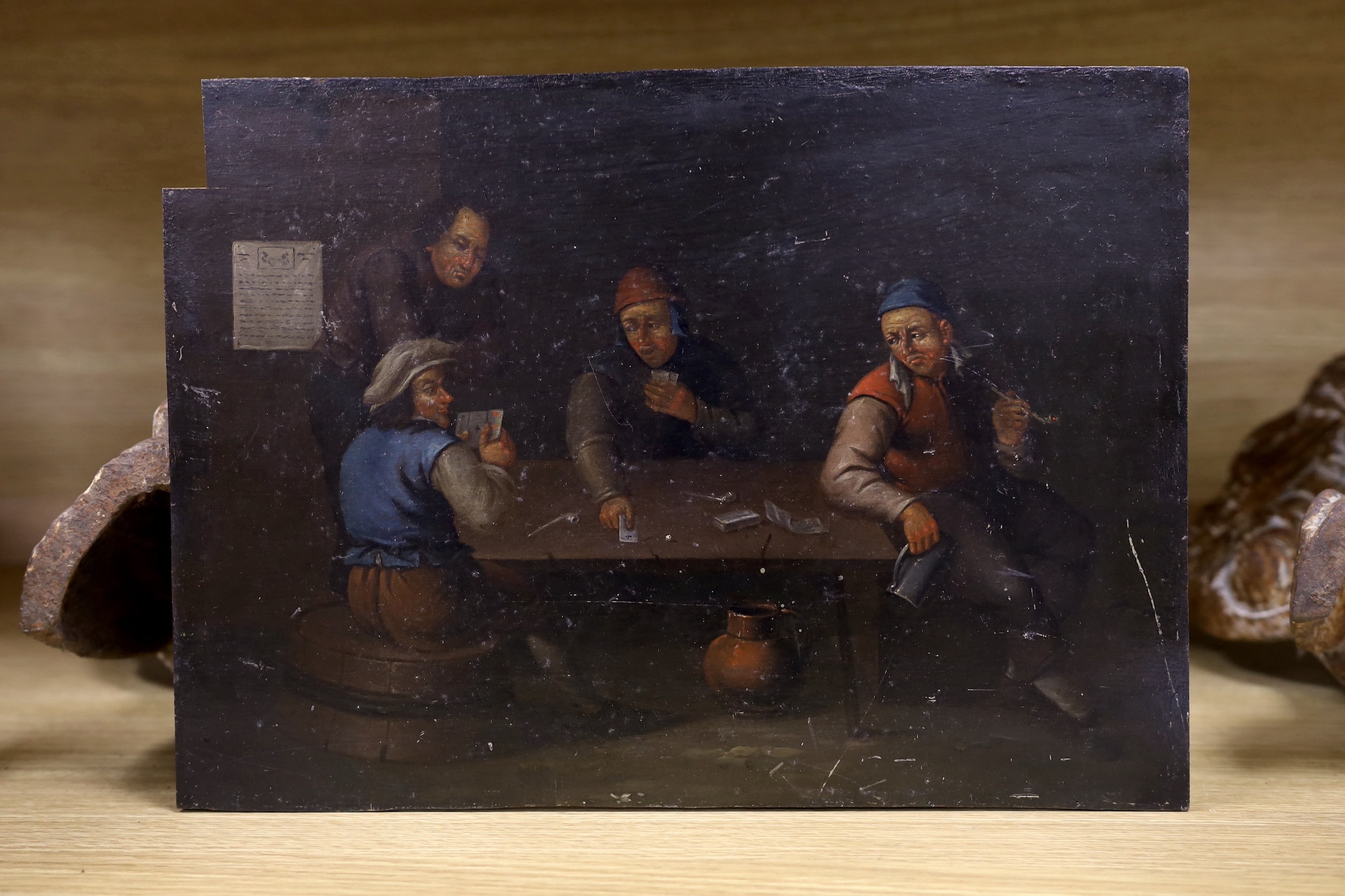 19th century Flemish School, oil on wooden panel, 17th century tavern interior, 28 x 38.5cm, unframed